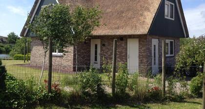 Detached Beachvilla with a large yard, two bathrooms, and the option for a location on the open water at Beach Resort Makkum.