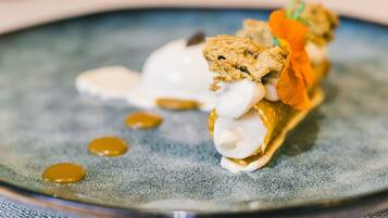 A dessert on a plate with a textured blue surface.