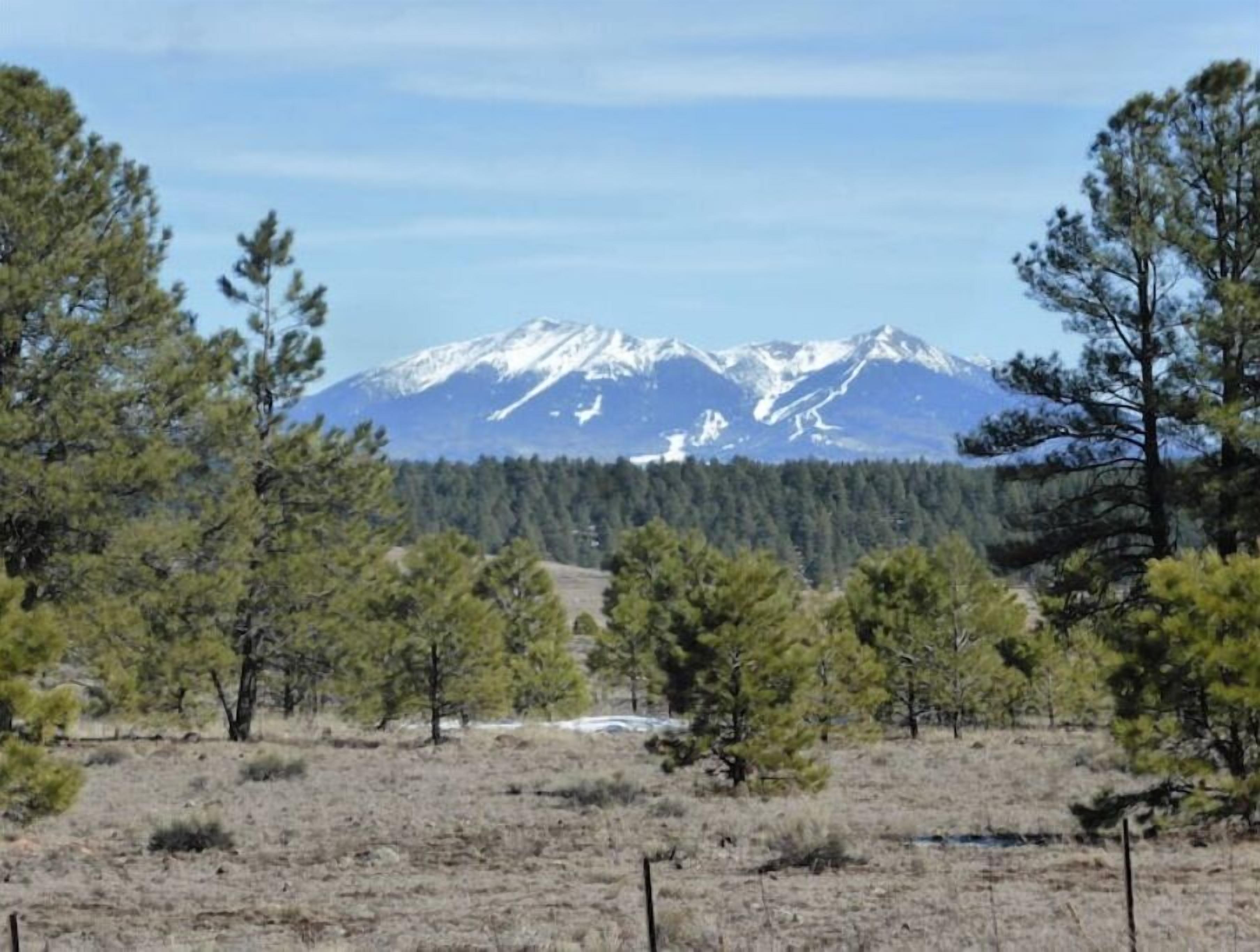A mountainous landscape with a clear sky.