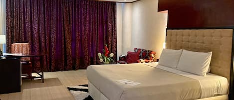 Deluxe Room, 1 King Bed | In-room safe, desk, laptop workspace, free WiFi