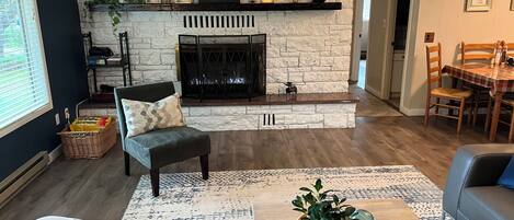 Smart TV, fireplace, table football, books