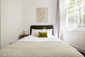 1 bedroom, desk, iron/ironing board, travel cot