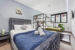 1 slaapkamer, een strijkplank/strijkijzer, wifi, beddengoed