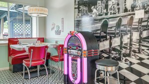 A diner with red booths, a jukebox, and a checkered floor. - San Antonio Retreat w/ Private Hot Tub & Gas Grill (San Antonio)