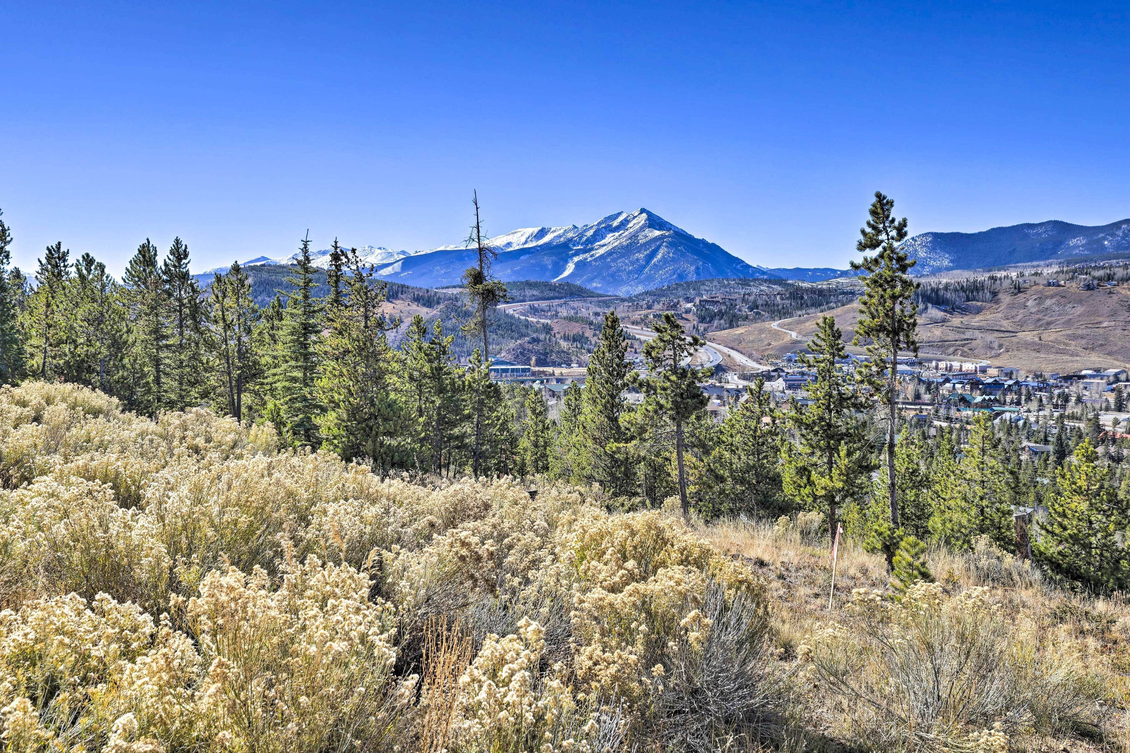A mountainous landscape with a town in the valley.