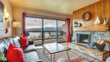 Apartment (1 Bedroom) | Living area | TV, fireplace, video-game console, DVD player