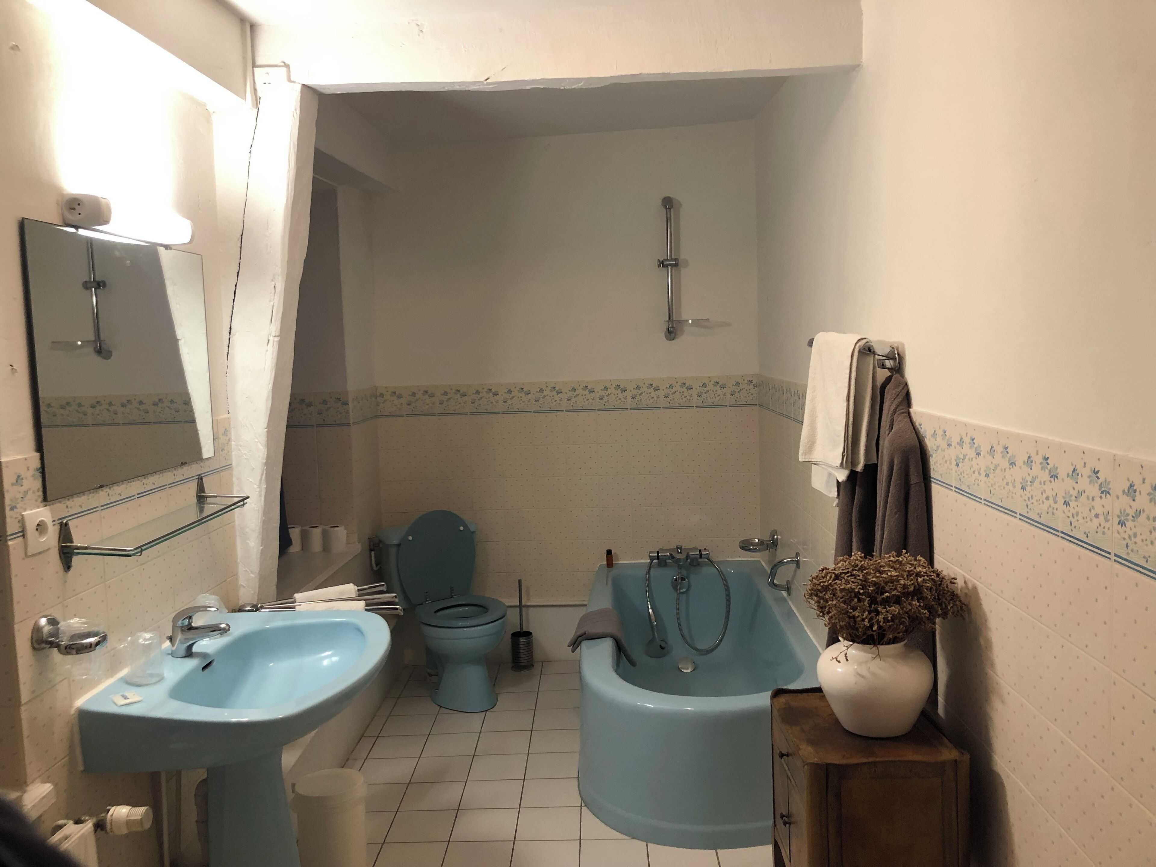 Bathtub, hair dryer, towels, soap