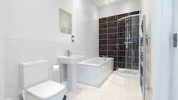 Exclusive Apartment, 2 Bedrooms | Bathroom | Shower, towels, toilet paper