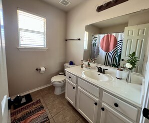 Hair dryer, towels, soap, shampoo