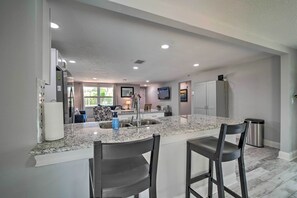 House (2 Bedrooms) | Private kitchen | Microwave, oven, stovetop, dishwasher - Relaxing Port Richey Getaway w/ Lanai & Pool! (Port Richey)