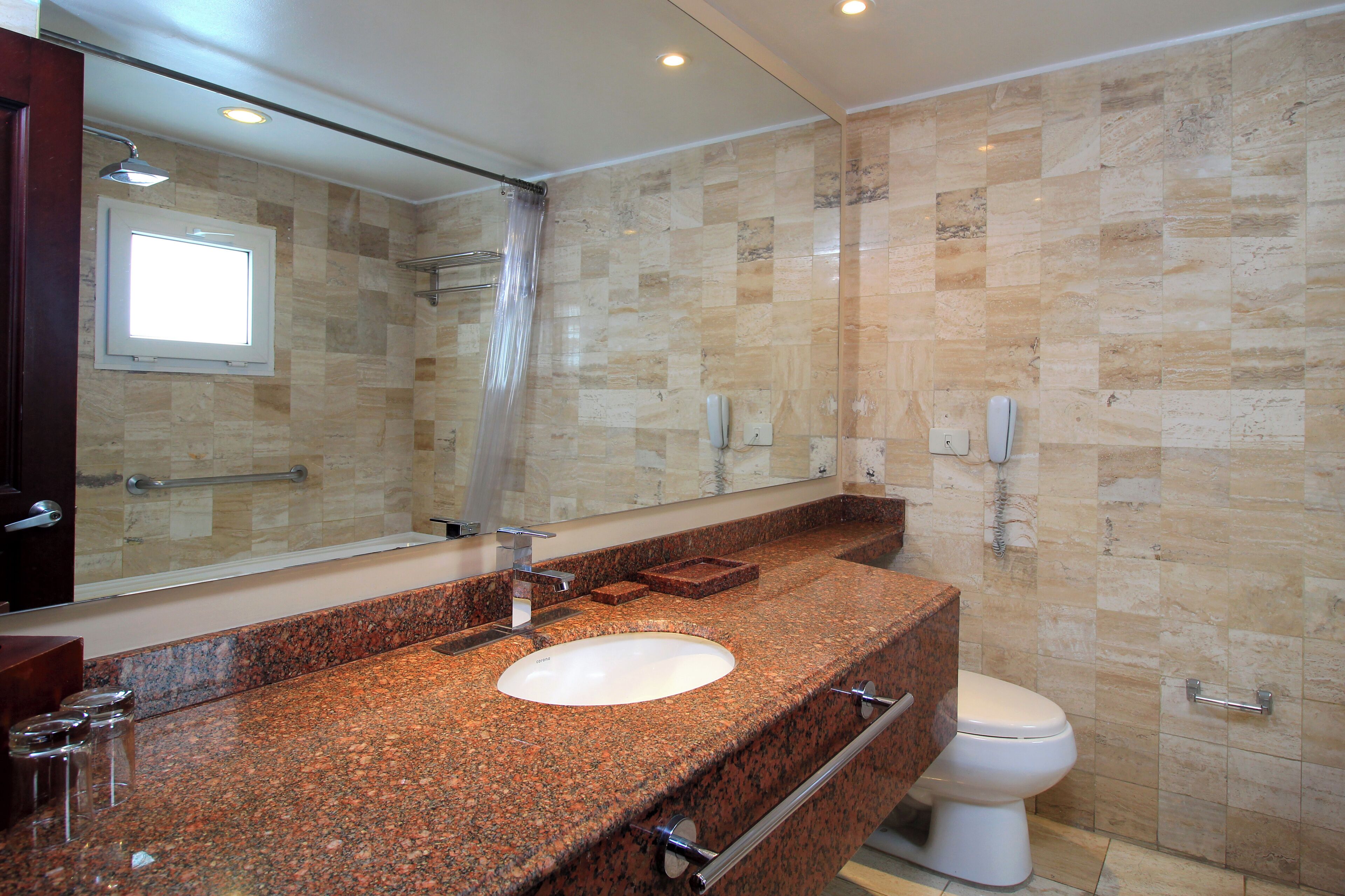 Foto - Windsor House Inn By Geh Suites