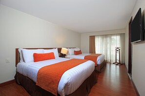 Premium bedding, down comforters, minibar, in-room safe