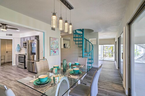 Tropical Waterfront Home: Central Location!