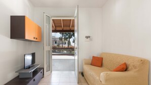 Apartemen | Area keluarga | TV layar datar