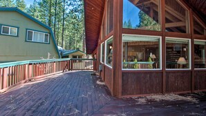 A wooden cabin with large windows and a deck. - 5 Mi to Heavenly Mountain Resort: All-seasons Gem (South Lake Tahoe)