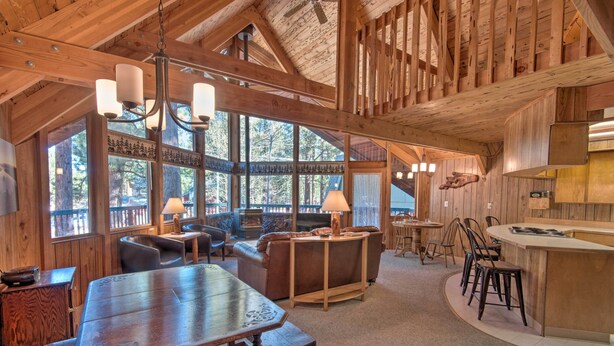 A rustic wooden interior with a large dining table, seating area, and kitchen. - 5 Mi to Heavenly Mountain Resort: All-seasons Gem (South Lake Tahoe)