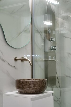 Shower, free toiletries, hair dryer, towels