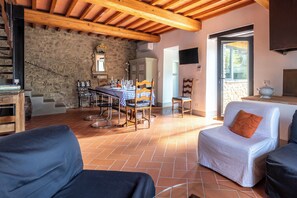 Villa | Living area | 32-inch flat-screen TV with satellite channels, TV