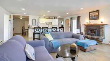 TV, fireplace, books