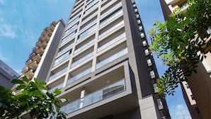 A modern building with a sign reading "BELINT" and the number "237". - Belint Paulista (São Paulo)