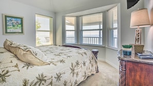 A bedroom with a bed, a desk, and a window. - Bayfront Niceville Getaway w/ Private Dock! (Niceville)