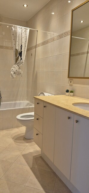 Hair dryer, towels, toilet paper