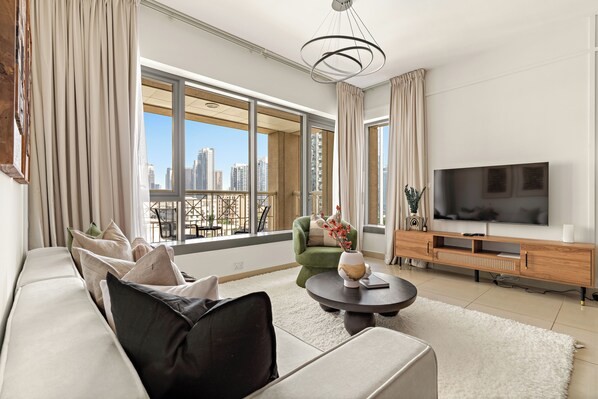 Elite Apartment | Living area | 50-inch Smart TV with digital channels