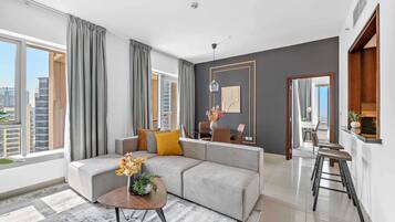 Business Apartment (29BLVD T1 2204) | Living room | 50-inch Smart TV with digital channels