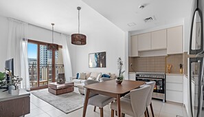 Deluxe Apartment | Dining room - WelHome - Urban Serenity, Zahra Breeze 2 Bedroom Retreat (Dubai)