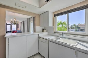 Microwave, oven, stovetop, dishwasher - Bayfront Holmes Beach Condo w/ Resort Perks! (Holmes Beach)