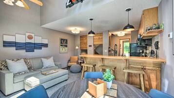 TV, fireplace, books