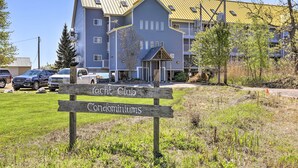 A residential building with a sign indicating 'Yacht Club Condominiums'. - Waterfront Middle Bass Condo w/ Pool Access! (Put-in-Bay)