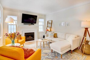 House (3 Bedrooms) | Living area | TV, fireplace, books - Charming Minneapolis Home < 1 Mi to Lakes! (Minneapolis)