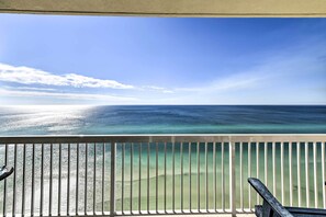 A balcony with a view of the ocean. - Oceanfront Panama City Beach Condo w/ Pool Access! (Panama City Beach)