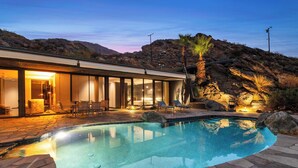 A modern house with a swimming pool, outdoor seating, and a view of the mountains. - Palm Springs Retreat w/ Private Pool & Jacuzzi (Palm Springs)