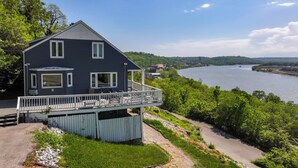 A two-story house with a balcony, a river view, and a forested landscape. - Riverview Hideaway, 3 Mi to Dtwn Cincinnati (Cincinnati)