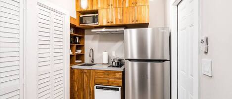 Fridge, microwave, stovetop, coffee/tea maker