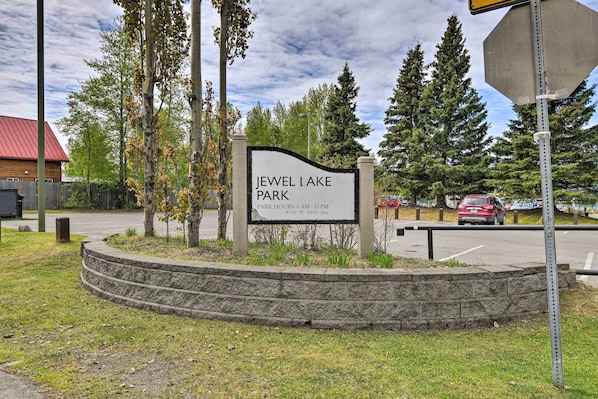 A sign for Jewel Lake Park with park hours and an address. - 8 Mi to Dtwn Achorage! Home w/ Pet-friendly Yard (Anchorage)