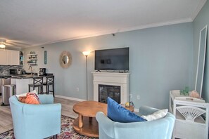 TV, fireplace - Central Studio w/ Deck: Walk to Shops & Dining! (Ocean City)