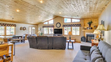 House (3 Bedrooms) | Living area | Fireplace, books