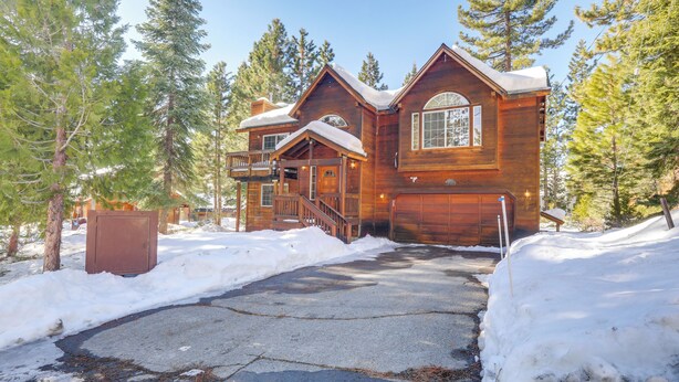 A large wooden cabin with a covered porch, a garage, and a driveway. - 7 Mi to Northstar Resort: Tahoe Vista Family Cabin (Kings Beach)