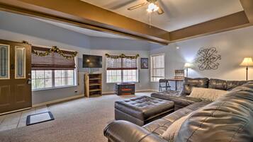 TV, fireplace, books