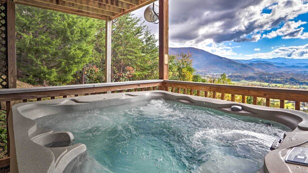 A hot tub with a wooden deck and a view of mountains. - Smoky Mountain Retreat w/ Hot Tub, Arcade Games (Sevierville)