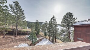 A wooden deck with a view of a snowy landscape and trees. - Angel Fire Resort Condo, 400 Feet to Chile Express (Angel Fire)