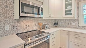 A kitchen with a built-in microwave, oven, and toaster. - Orlando Vacation Rental < 2 Miles to Lake Ivanhoe! (Orlando)