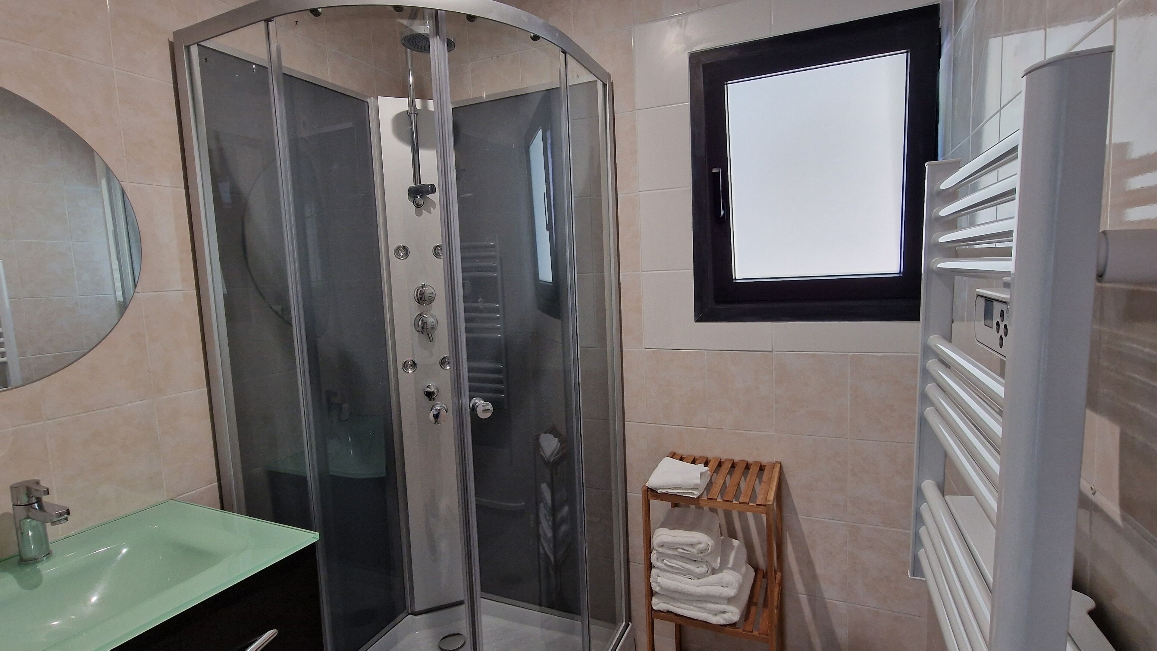 Shower, hair dryer, towels, soap