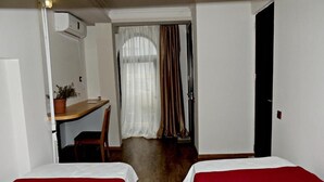ห้องคลาสสิกดับเบิลหรือทวิน | เครื่องนอนระดับพรีเมียม, ผ้าม่านกันแสง, เตารีด/โต๊ะรีดผ้า, Wi-Fi ฟรี