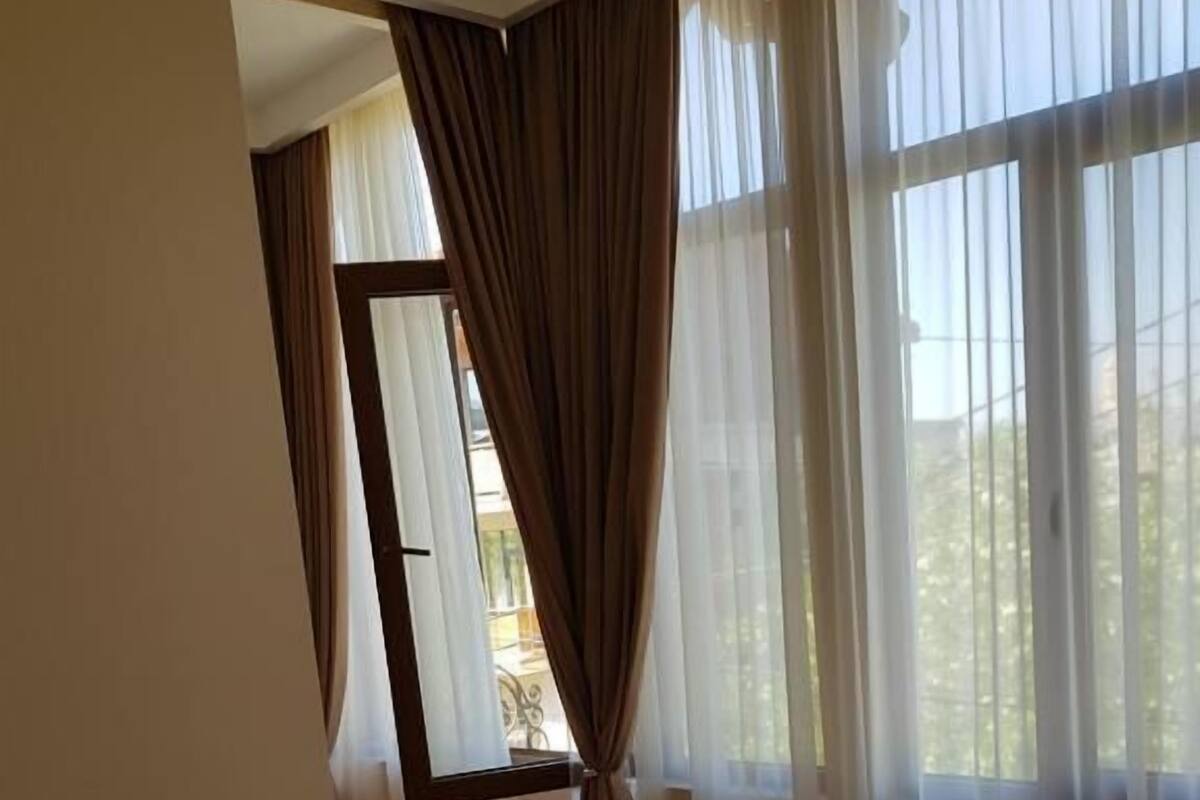 Family Apartment | Premium bedding, blackout drapes, iron/ironing board (on request)