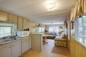 House (2 Bedrooms) | Interior - Little Manistee Riverfront Cabin w/ Fire Pit! (Irons)