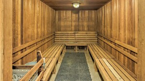 A sauna with wooden benches and a central bench. - Colorado Escape w/ Pool Access & Mountain Views! (Avon)